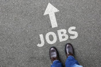 Pfeil auf Boden mit der Aufschrift "Jobs"